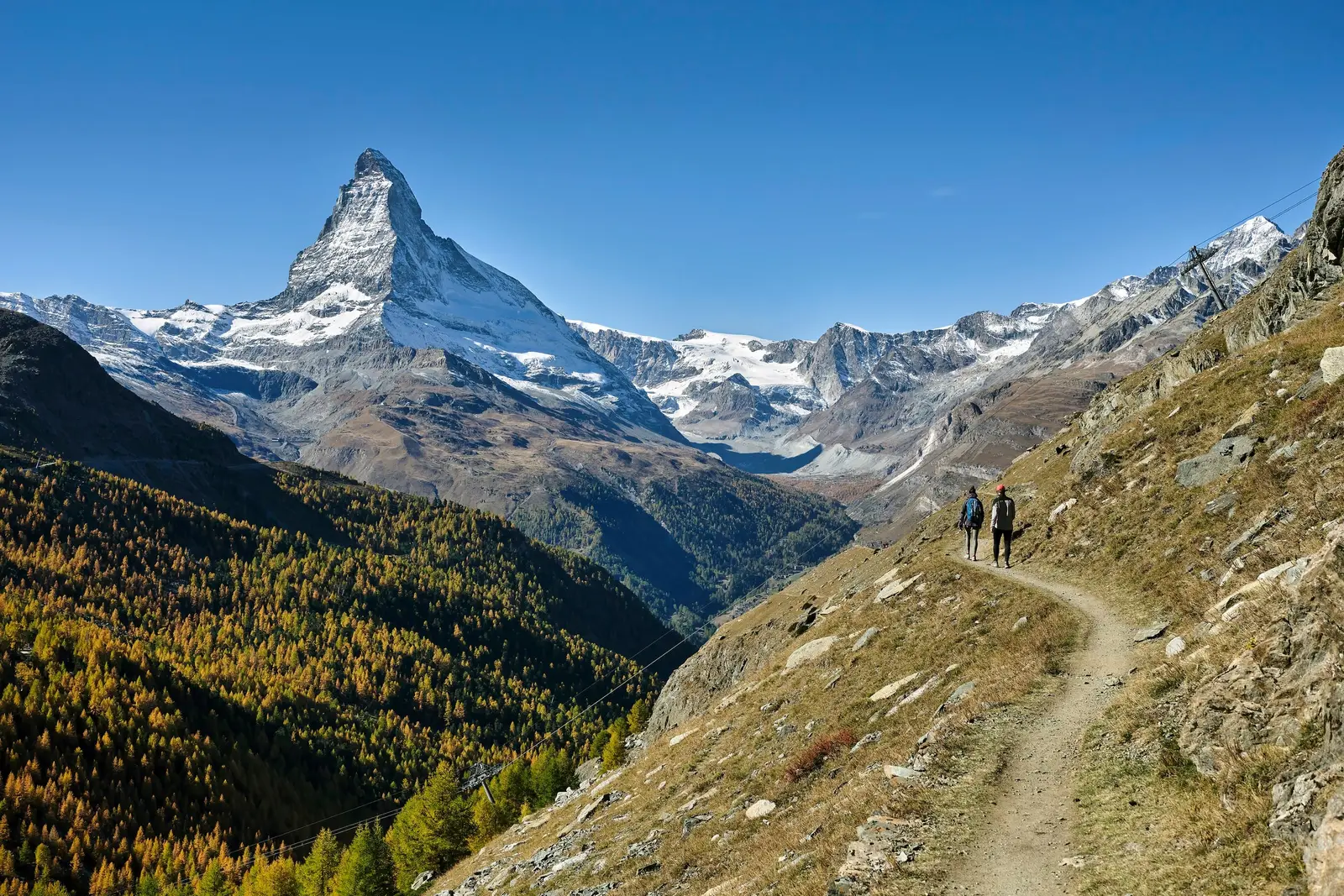 The Matterhorn above an alpine trail in autumn