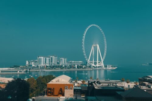 pexels-photo-33996797-33996797-1 Aerial view of Ain Dubai Ferris Wheel against a clear blue sky, Dubai Waterfront.