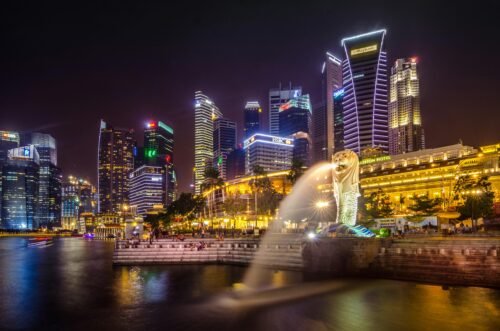 pexels-photo-777059-777059-1 Dazzling view of the Singapore cityscape with Merlion and illuminated skyscrapers at night.